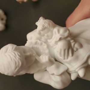 Girl shushing baby dept 56